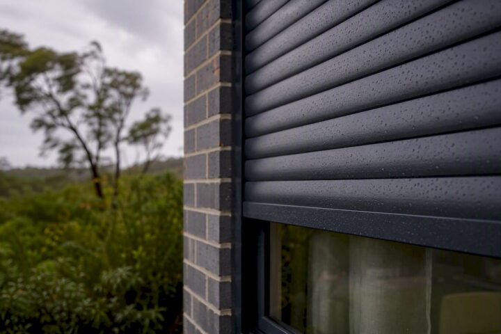 Roller shutter protecting window from storm